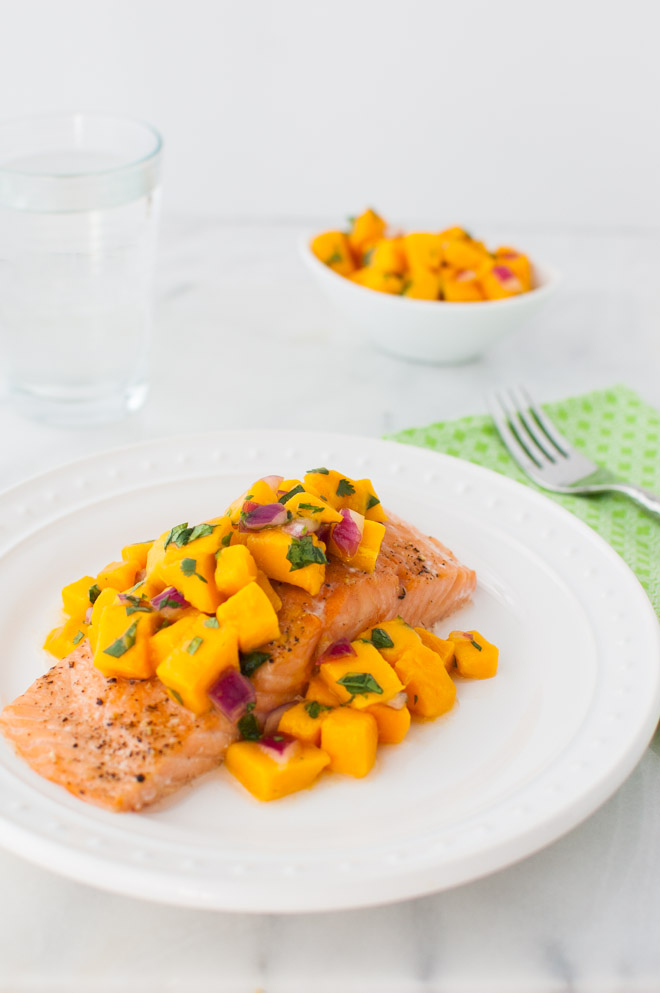 Roasted Salmon with Mango Salsa - Oven roasted salmon topped with a bright, sweet, and spicy mango salsa. | stg-tamingofthespooncom-staging.kinsta.cloud