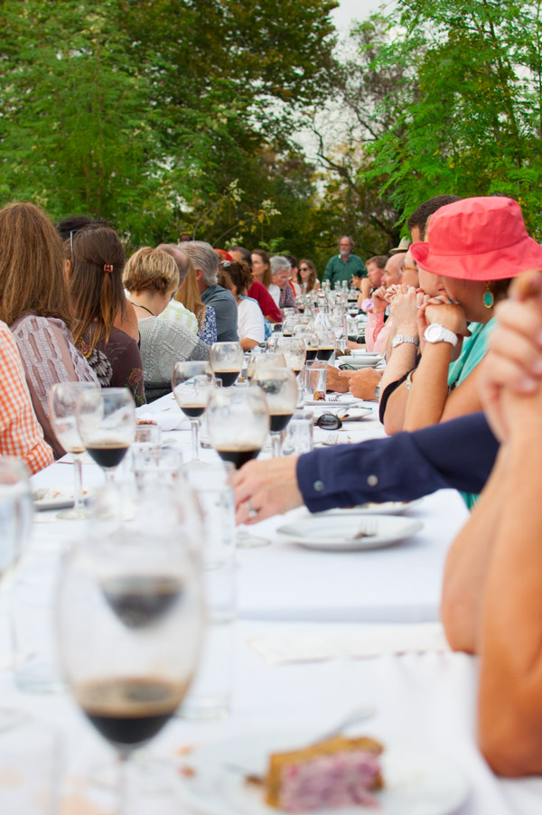 People sitting at a long table.