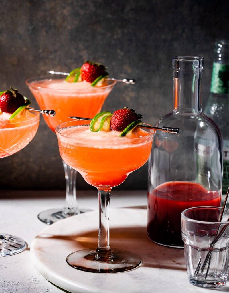 Close-up of a strawberry mocktail in a coupe glass.