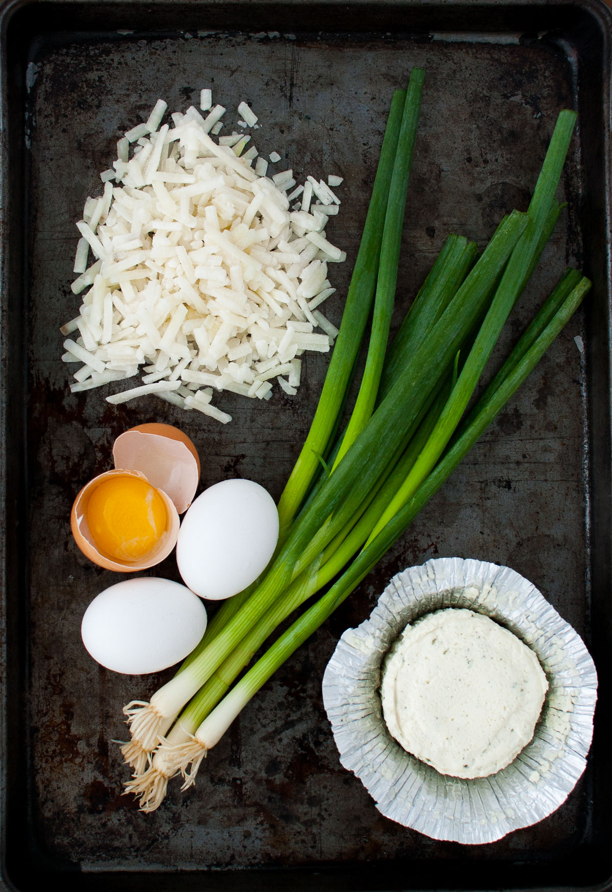 Ingredients to make potato and boursin frittata.