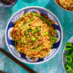 Stir-fried noodles on a plate.